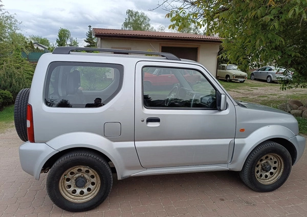 Suzuki Jimny cena 32900 przebieg: 154200, rok produkcji 2010 z Górowo Iławeckie małe 352